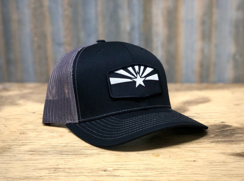 BLACK AND CHARCOAL CURVED TRUCKER WITH AZ PATCH